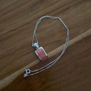 Pink coral and sterling silver pendant on silver box chain